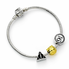 Harry Potter Silver Plated Bracelet with Deathly Hallows, Golden Snitch and Platform 9 3/4 Charm HP000372